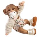 Papusa reborn maimuta bebelus Guca, 32 cm, corp din vinil, design expresiv si pietenos, complet articulat, cu incaltari sport, pantaloni scurti cu bretele si pulover bej, suzeta cu lant incluse, 3 ani+